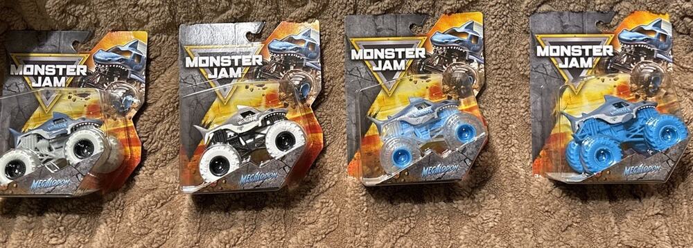 SPIN MASTER 2025 MONSTER JAM MEGALODON SERIES #01 4 TRUCK SET NEW!